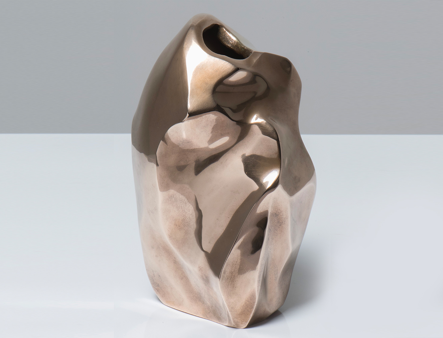 SMALL ASYMMETRIC BRONZE VASE FROM THE 60S